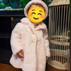 Millicent's vintage baby jacket and bonnet